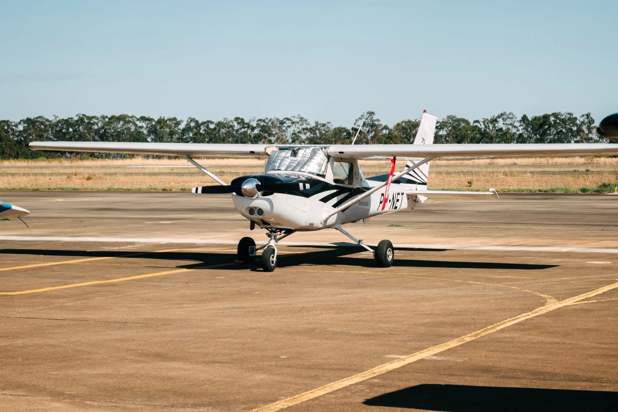 A light aircraft taxiing at a small airport